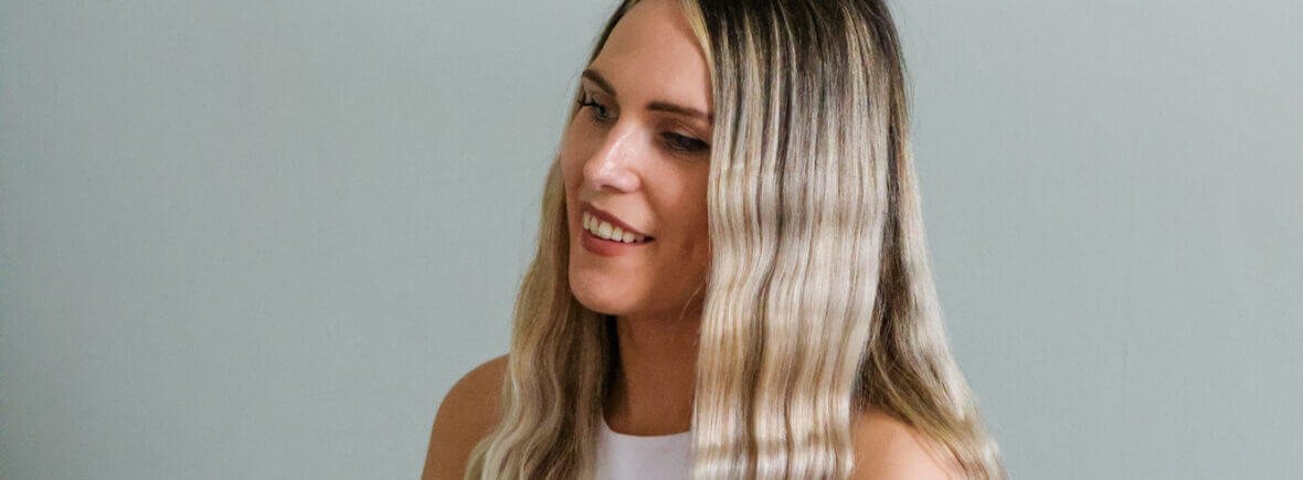 Sophie from Be About Health smiling during a Reiki session in Yeovil.